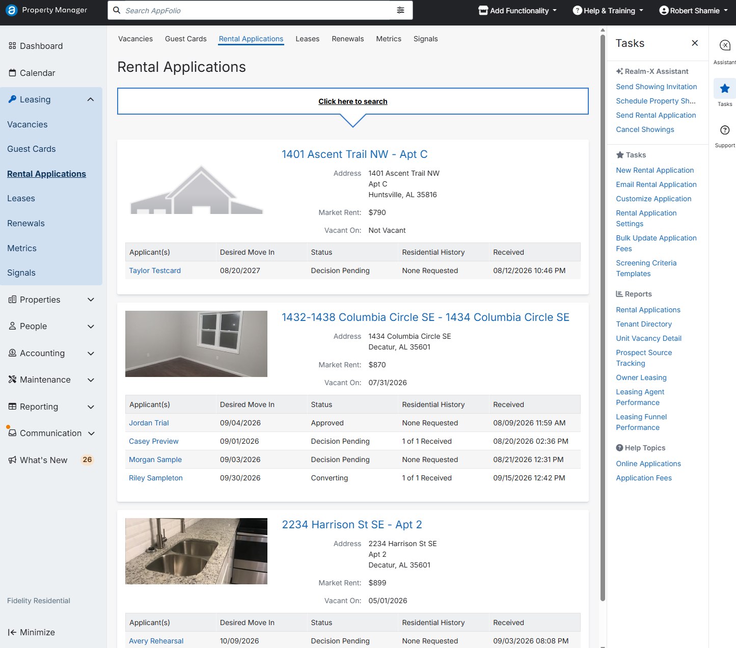 Rental Applications list grouped by property with applicant, move-in, status and received date